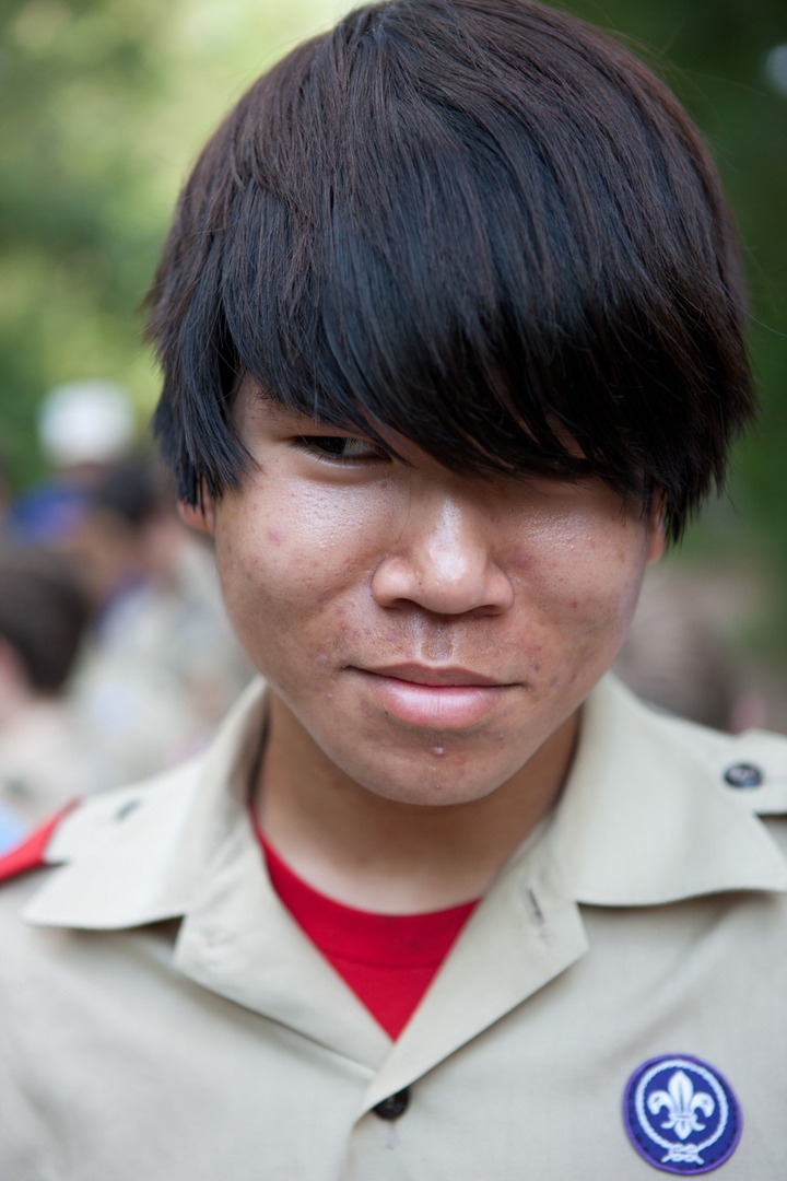 A guy with a red shirt underneath his uniform