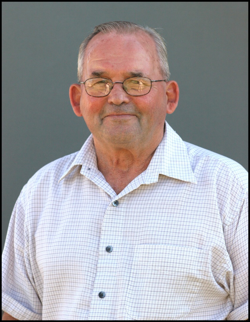 A man with yellow glasses